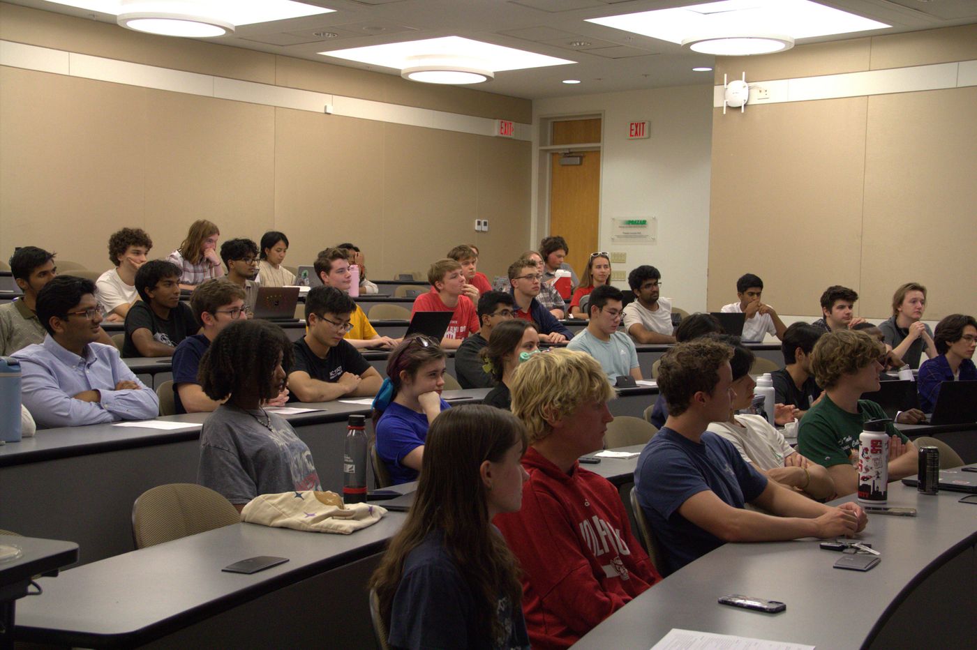 Attendees listening to presenters at the ADI workshop