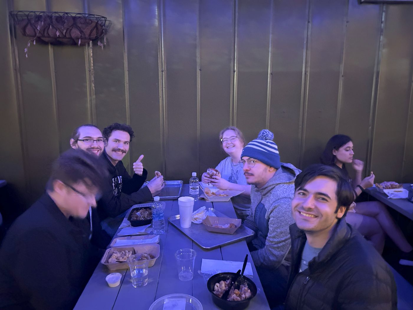 Elizabeth G. eating with members of SolarPack.